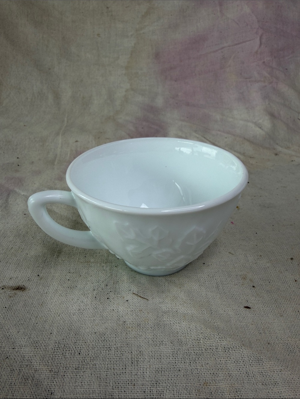 White Milk Glass Teacup with Floral Relief